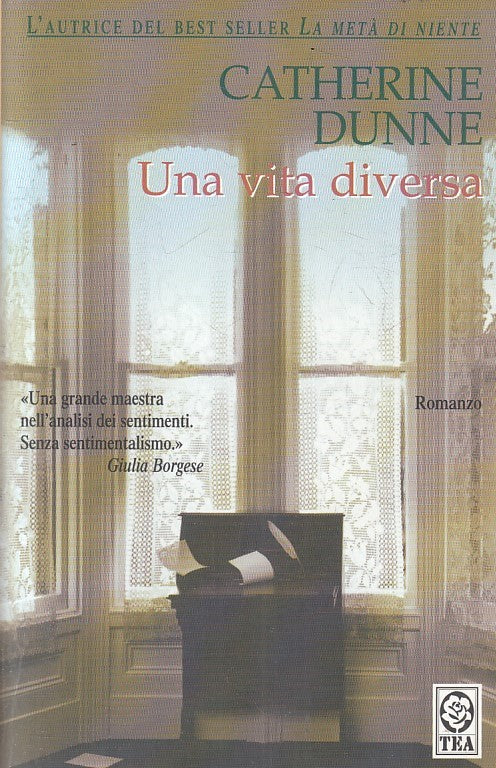 LN2- UNA VITA DIVERSA - CATHERINE DUNNE - TEA TEADUE - B - JXS201