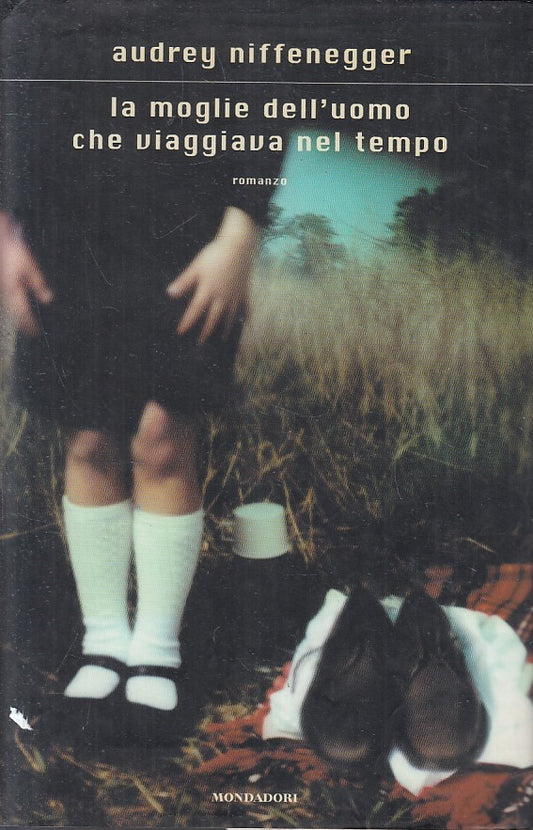 LN2- MOGLIE UOMO CHE VIAGGIAVA NEL TEMPO - NIFFENEGGER - MONDADORI - CS - JXS214